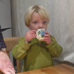 sampling a small beaker of water